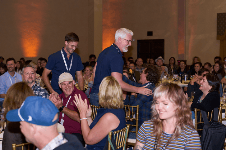 jamie booth and chris mueller in 1% for the planet global summit 2024